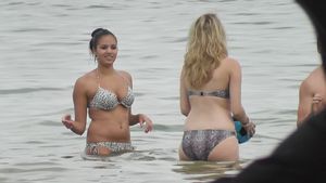 Bikini girls playing ball in the surf07c3c8vbe6.jpg